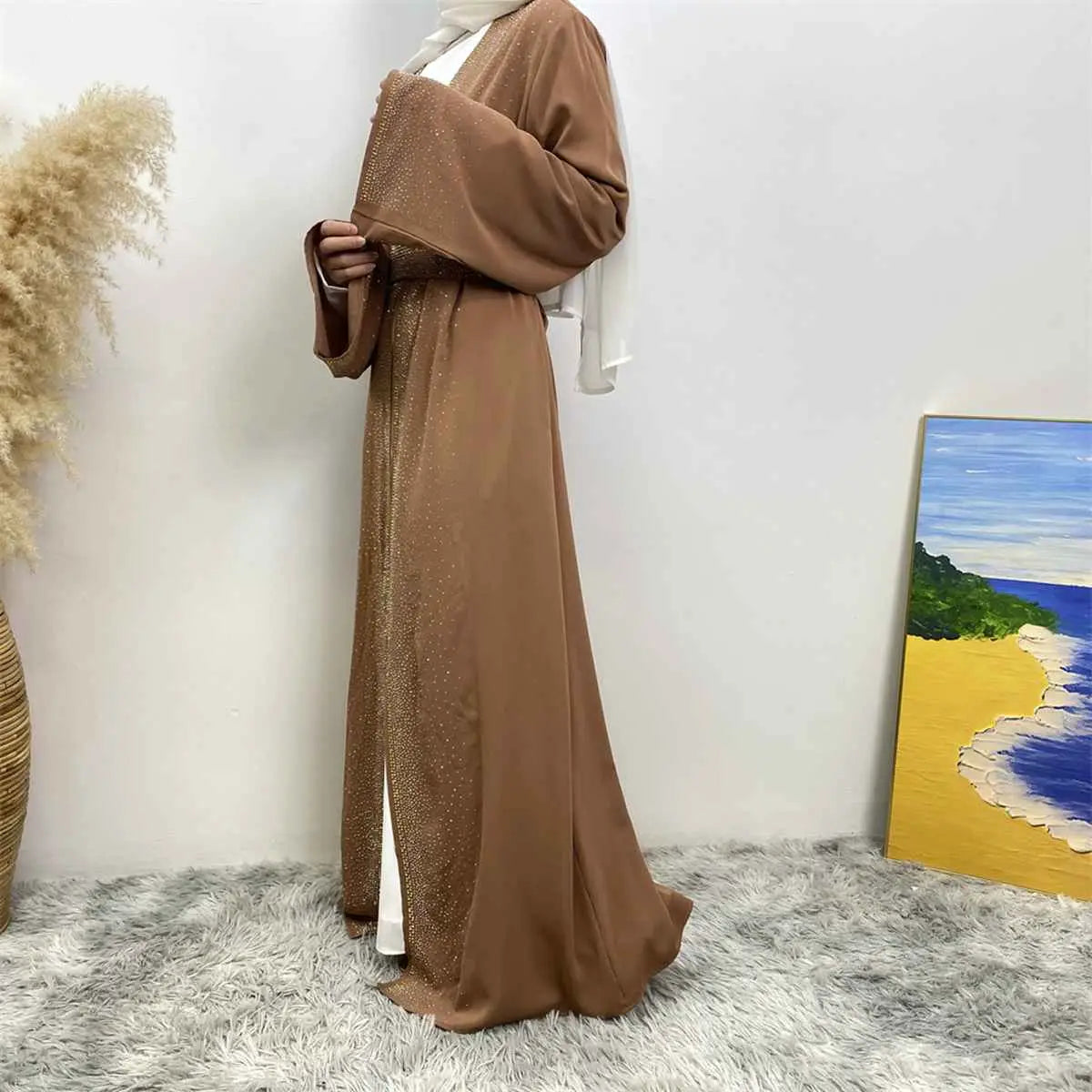 فستان عباية نيدا مفتوح مزين بجيوب وأحجار الراين