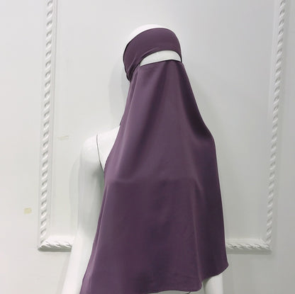 نقاب نسائي بعشرة ألوان