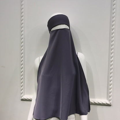 نقاب نسائي بعشرة ألوان