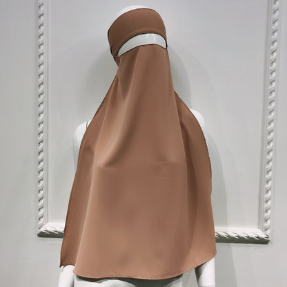 نقاب نسائي بعشرة ألوان