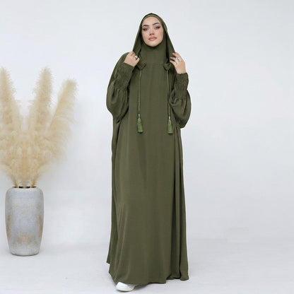 Army green hooded jilbab abaya, front view, smocked sleeves and matching tassel drawstrings