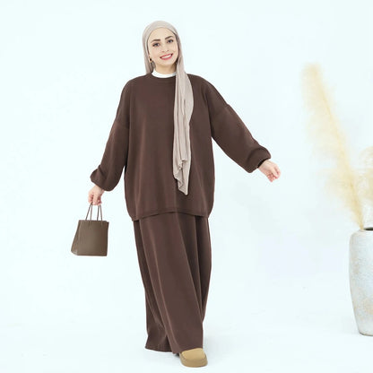 طقم ملابس محتشمة لفصل الشتاء والخريف مكون من قطعتين، يتكون من بلوزة محبوكة وتنورة