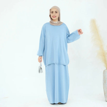 طقم ملابس محتشمة لفصل الشتاء والخريف مكون من قطعتين، يتكون من بلوزة محبوكة وتنورة
